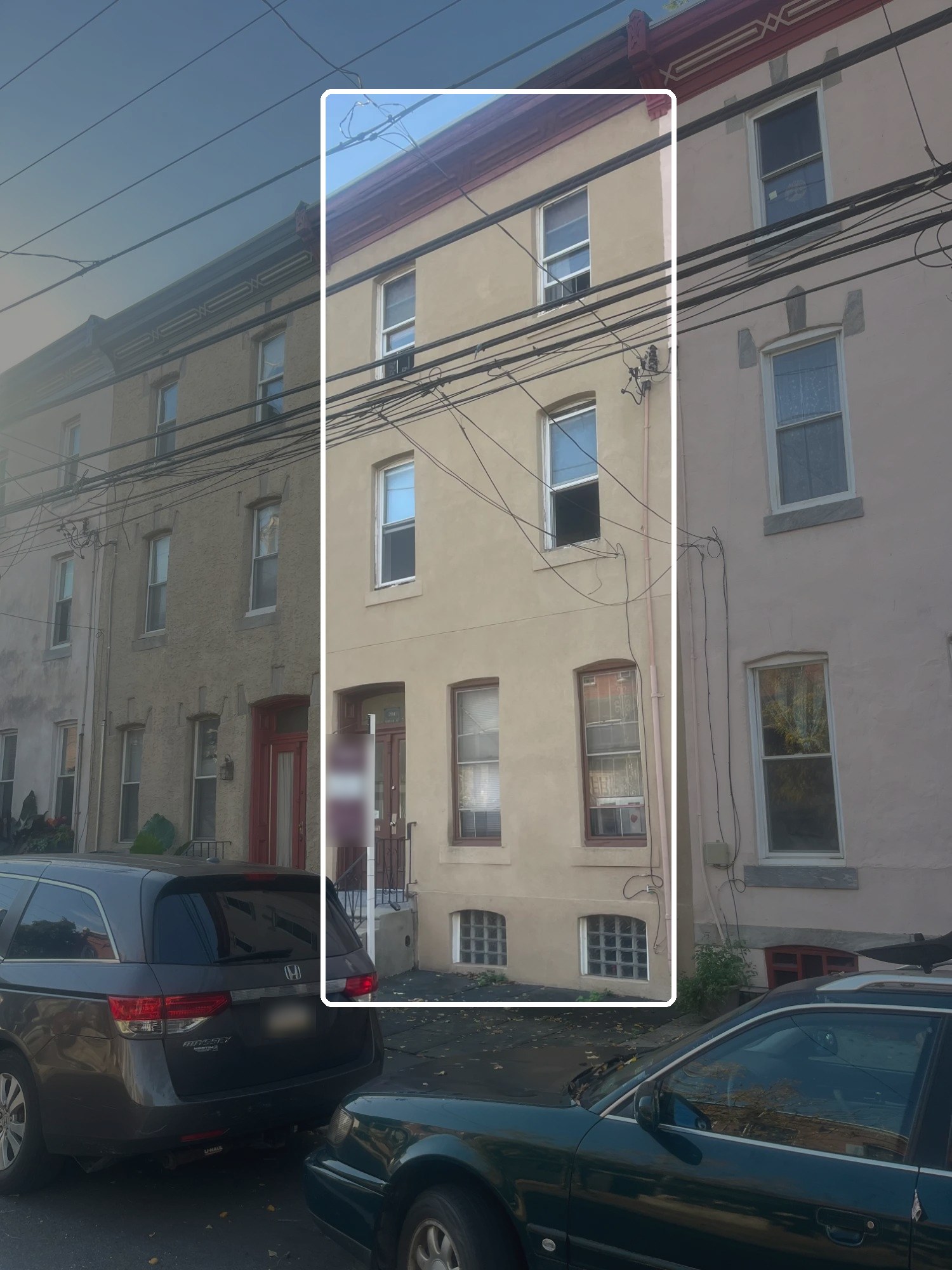 Three-story multi-family rowhouse in Philadelphia, with one building outlined